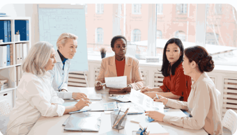  group of women PR professionals conducting media training 