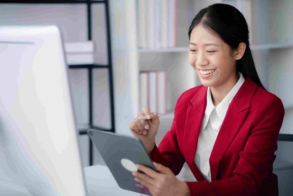 healthcare marketer writing on tablet 