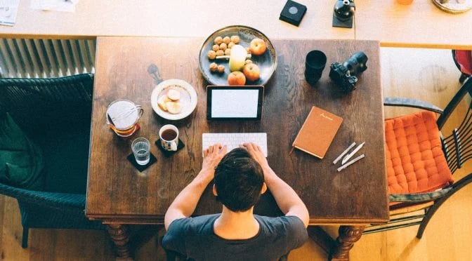 man-working-at-table_SS_website